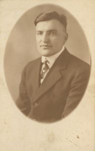 Picture postcard of my grandfather as a young man. Photo by Hirvela Studio, Ironwood, Michigan.